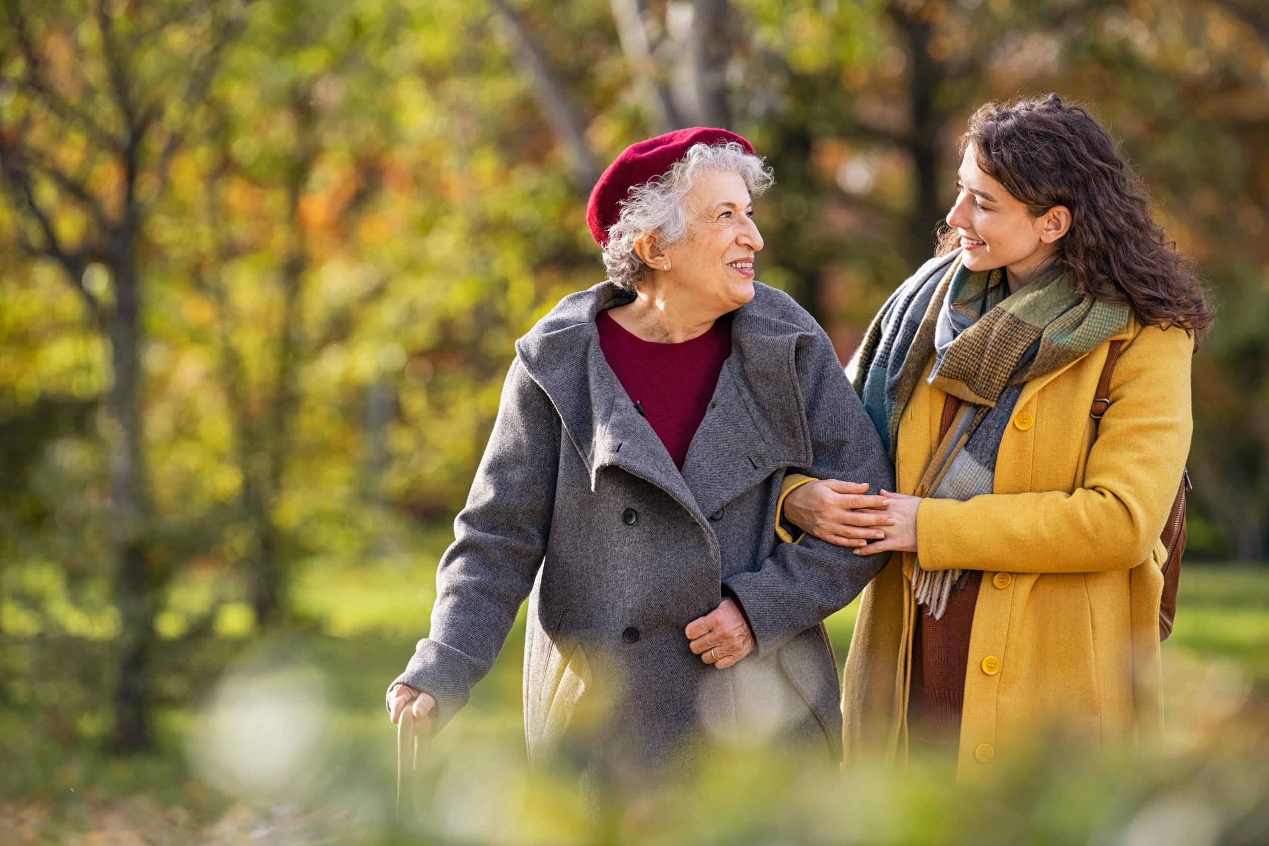 elderly woman and her caregiver